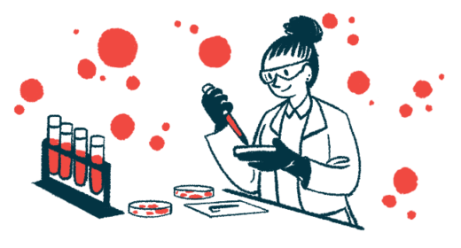 A scientist works with blood and petri dishes in a lab.